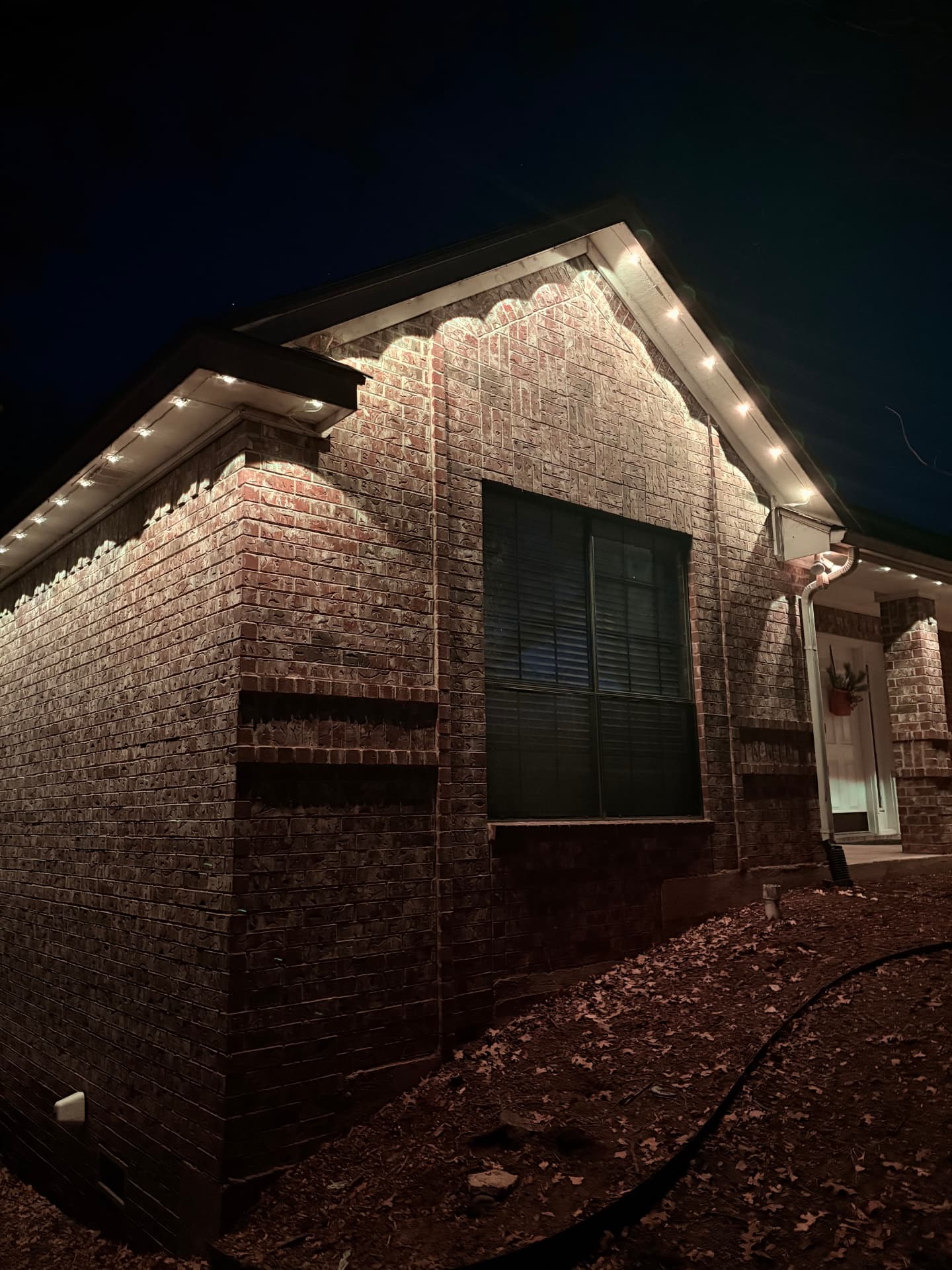 Home with permanent LED lighting at night